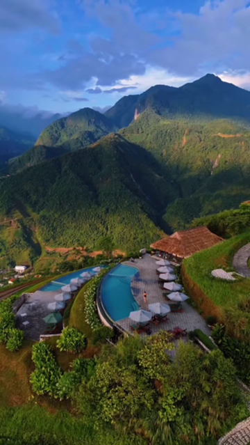 Golden rice terraces in Sapa during autumn harvest season under a clear sky