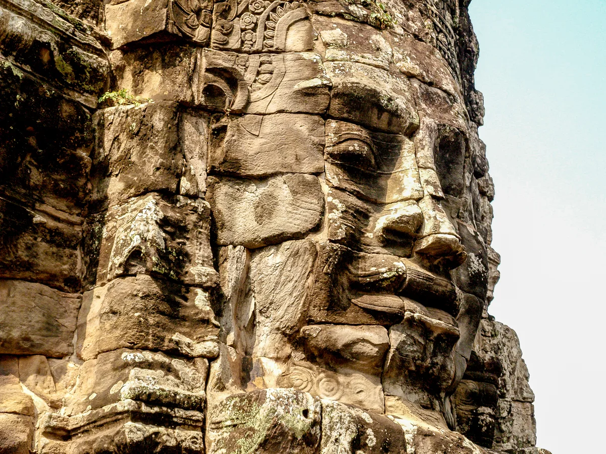 Carved smiling faces on Bayon Temple towers at Angkor Thom