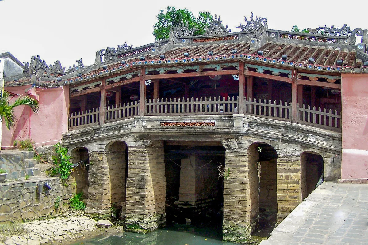 The historic Japanese Covered Bridge over a canal in Hoi An