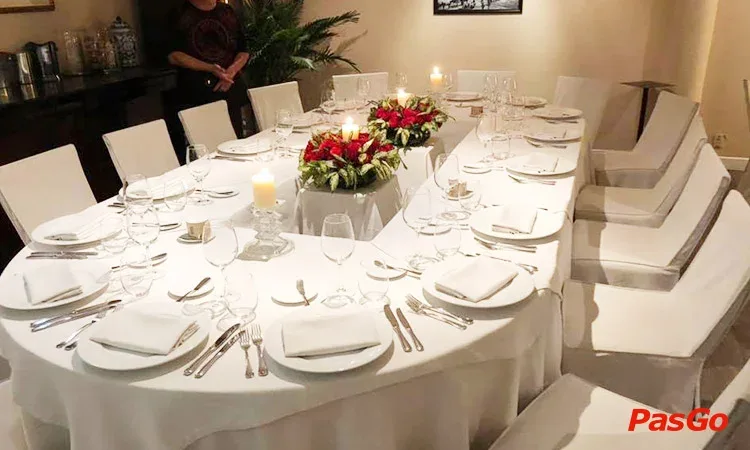 Elegant European-style dining room with formal table settings