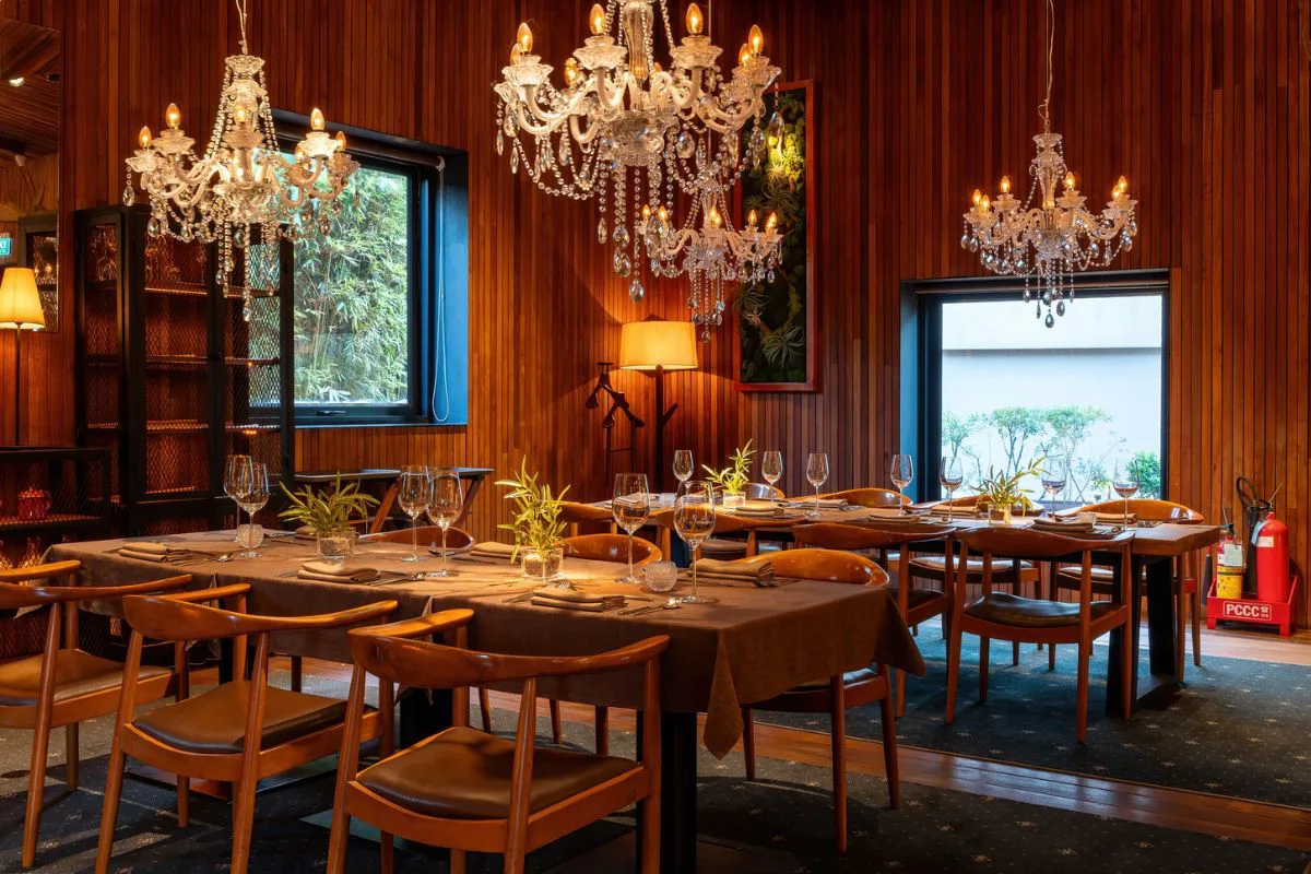 Elegant French restaurant interior with white tablecloths and warm lighting