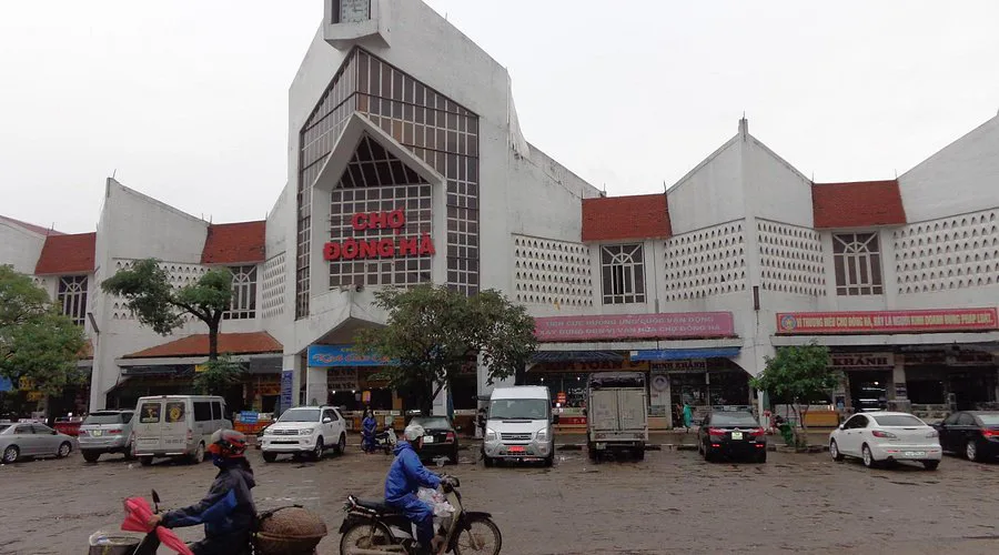 Panoramic view of Dong Ha city center with historical landmarks and bustling streets, reflecting its resilience and growth in