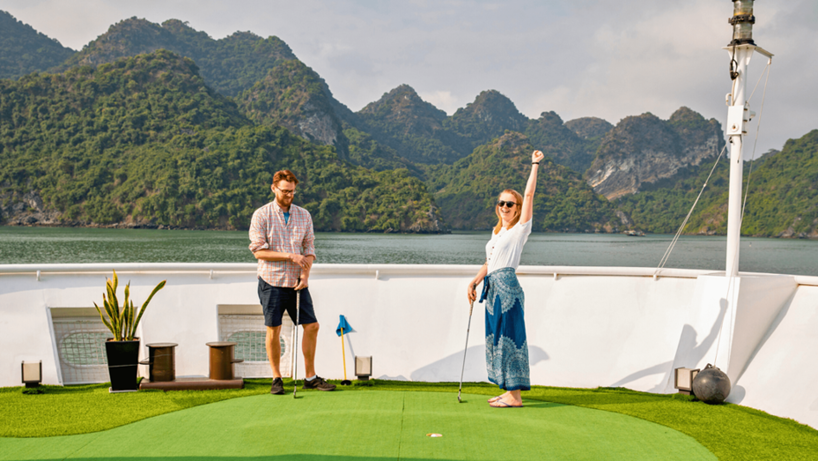 Luxury cruise on Halong Bay, Vietnam with limestone karsts