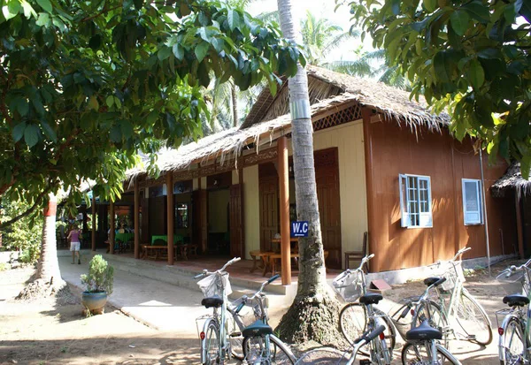 Homestay in Mekong Delta with a boat on the river
