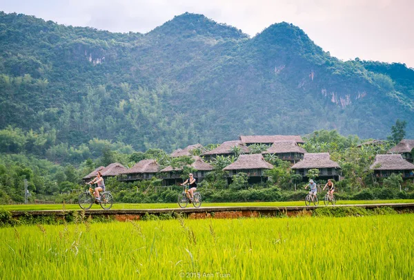 Panoramic view of Mai Chau valley with rice fields and traditional stilt houses